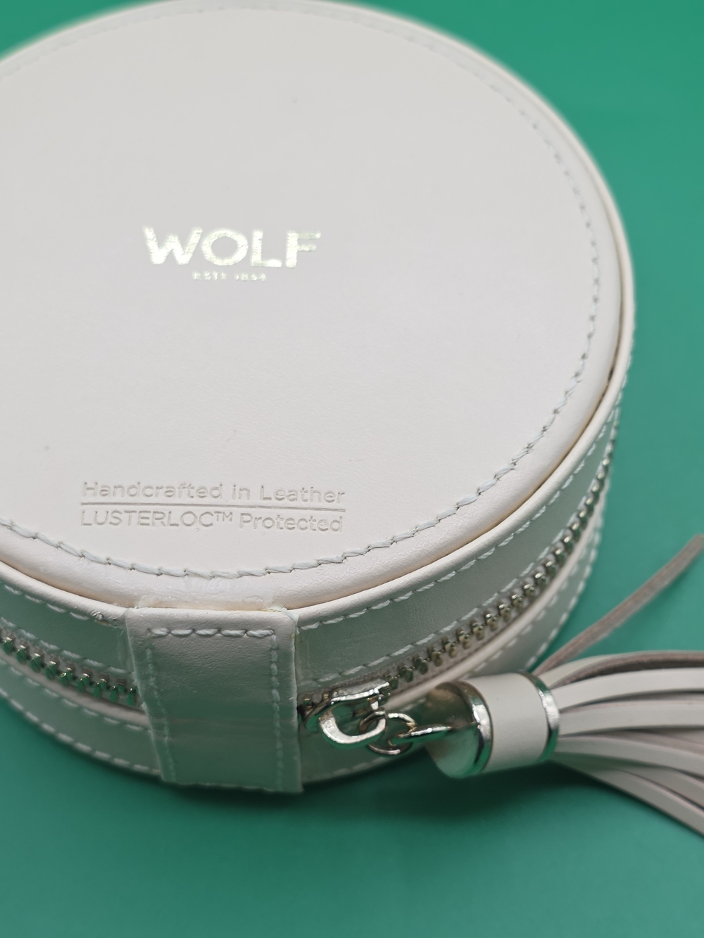 WOLF Caroline Round Travel Jewelry Case – Ivory Leather with Tassel